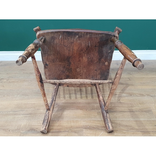 36 - A 19th Century ash and elm stick back Windsor Elbow Chair A/F 3ft 6in H x 2ft 1in W