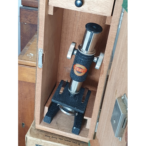 372 - A small Microscope in case and original Box, two mahogany microscope Cases (no microscopes), a chemi... 