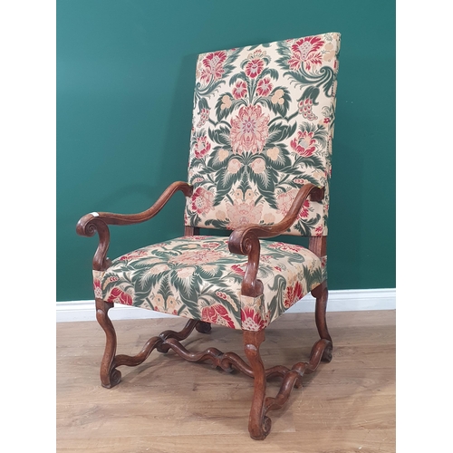 38 - A walnut framed Carolean style open Elbow Chair with cream and green floral upholstery 3ft 11in H x ... 