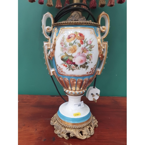 388 - A large porcelain Table Lamp and Shade, decorated panels of flowers and gilt detail, 2ft 8in H, pass... 