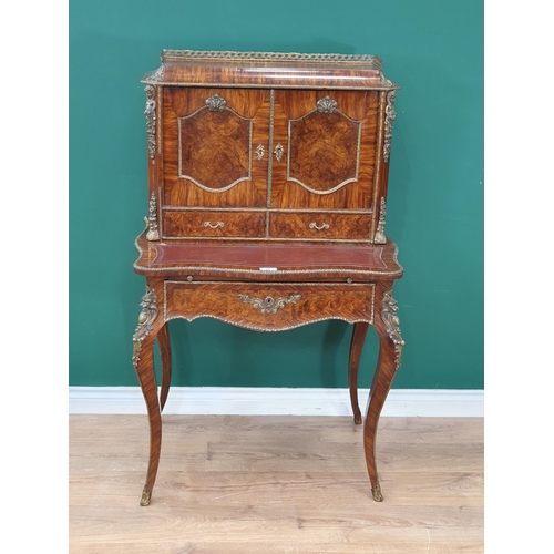 481 - A French 19th Century walnut Bonheur du Jour fitted pair of cupboard doors above two drawers and sin... 