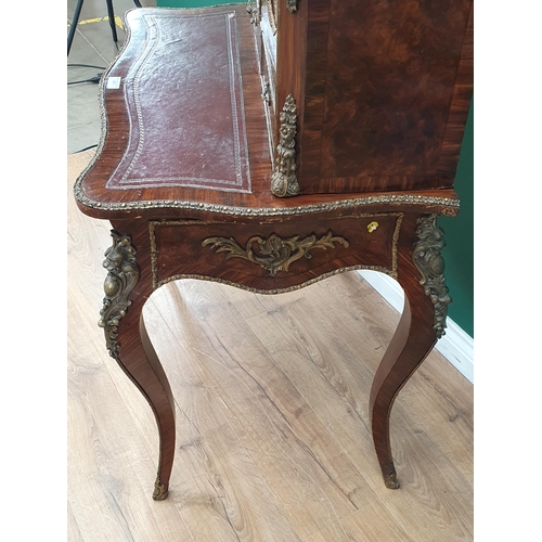 481 - A French 19th Century walnut Bonheur du Jour fitted pair of cupboard doors above two drawers and sin... 