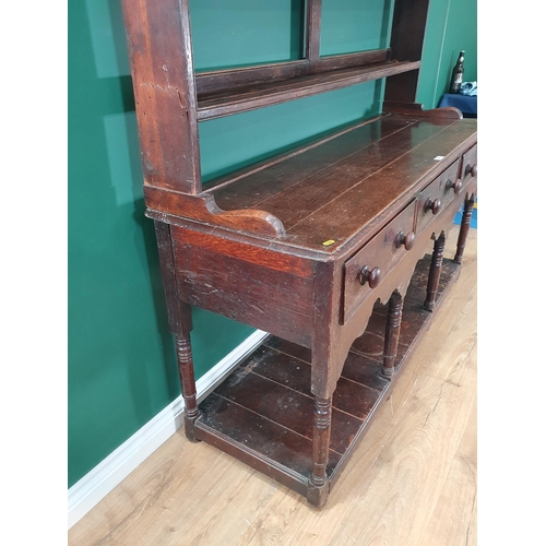 490 - A 19th Century Welsh Dresser with open rack fitted three drawers to pot board base 6ft 9in H x 5ft 1... 