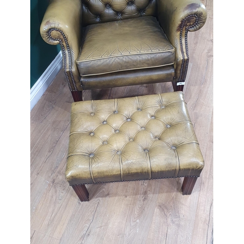 494 - A Wade green leather button upholstered wing back Armchair in the Georgian style 3ft 7in H x 2ft 8in... 