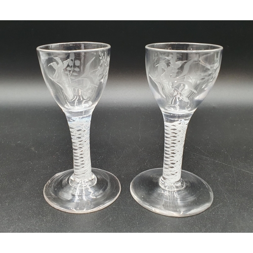 50 - A pair of 19th Century Glasses with funnel Bowls etched birds and flowers as multi series cotton twi... 