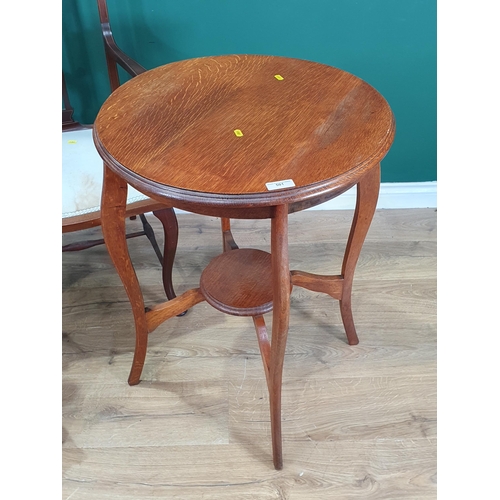 501 - Two Victorian mahogany and inlaid Elbow Chairs, a circular oak Centre Table and a low rush seated Ch... 