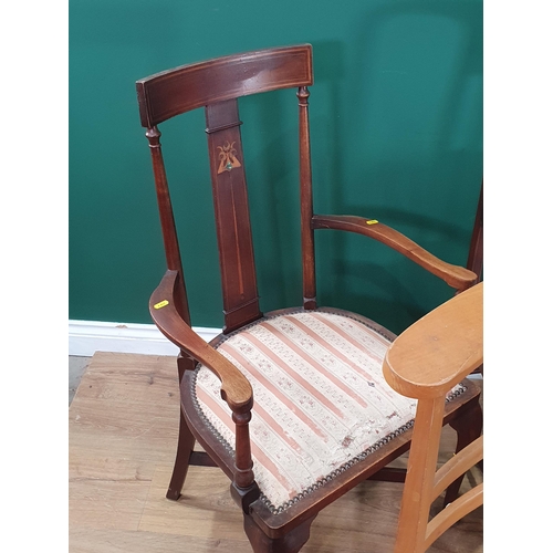 501 - Two Victorian mahogany and inlaid Elbow Chairs, a circular oak Centre Table and a low rush seated Ch... 