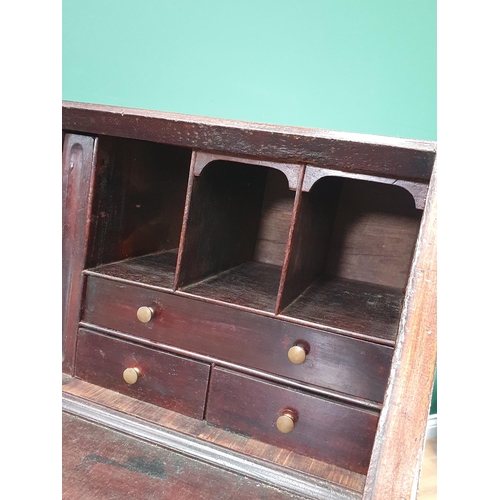 525 - A Scottish 19th Century mahogany Bureau, the fall front enclosing fitted drawer and pigeon hole inte... 