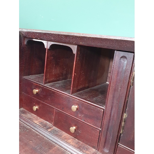 525 - A Scottish 19th Century mahogany Bureau, the fall front enclosing fitted drawer and pigeon hole inte... 