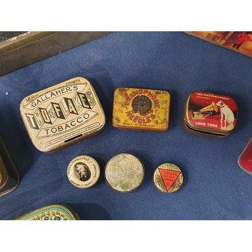 533 - A small collection of assorted Advertising Tins.