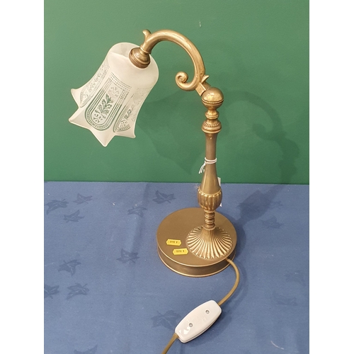 539 - A brass swivel top Table Lamp with etched glass shade, on shaped and fluted column raised on circula... 