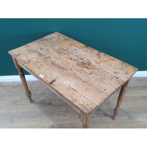 542 - A small Pine Table on turned supports, 2ft 6