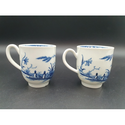 55 - Two early Worcester blue and white Tea Cups, decorated candle fence pattern, open crescent mark, sma... 