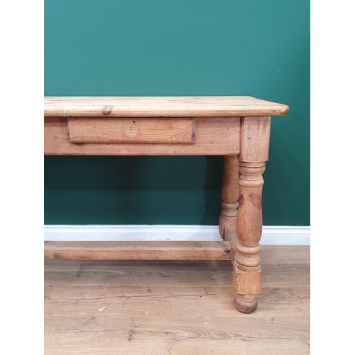 569 - A pine Side Table fitted pair of drawers on turned supports and central stretcher, 2ft 6