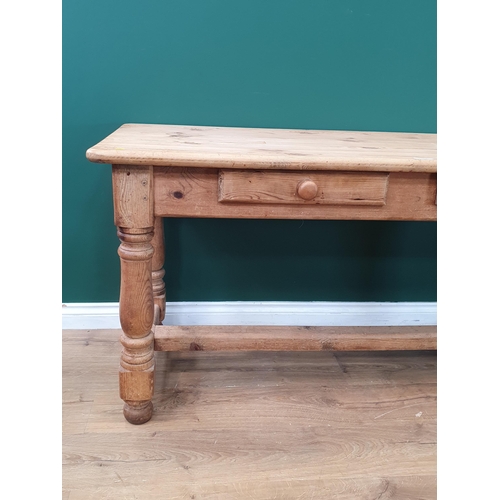 569 - A pine Side Table fitted pair of drawers on turned supports and central stretcher, 2ft 6