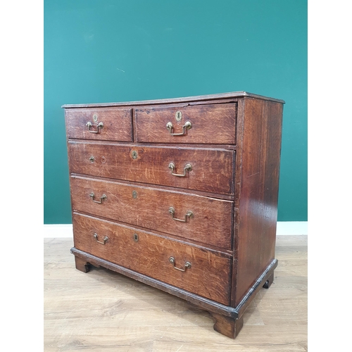 577 - A Georgian oak Chest of two short and three long drawers on ogee feet 3ft 4in W x 3ft 1in H