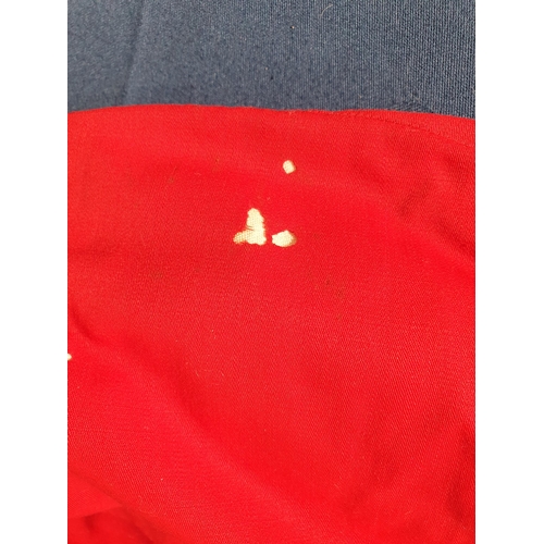 578 - A Childs red Military style Jacket (Moth Damaged).