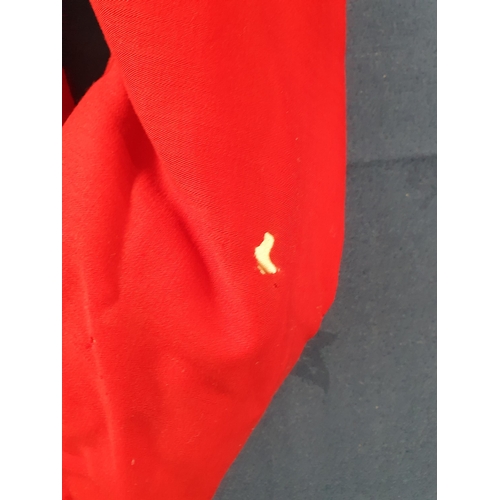 578 - A Childs red Military style Jacket (Moth Damaged).