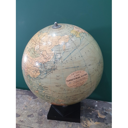 582 - A Philip's 19 INCH Terrestrial Globe (George Philip & Son Ltd 32 Fleet Street) on black square stepp... 