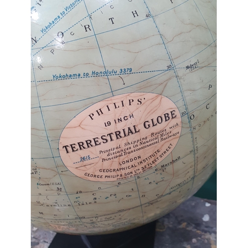 582 - A Philip's 19 INCH Terrestrial Globe (George Philip & Son Ltd 32 Fleet Street) on black square stepp... 