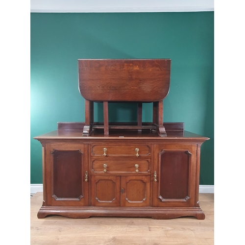 6 - A mahogany Sideboard with raised gallery, fitted two drawers above pair of cupboard doors, flanked b... 