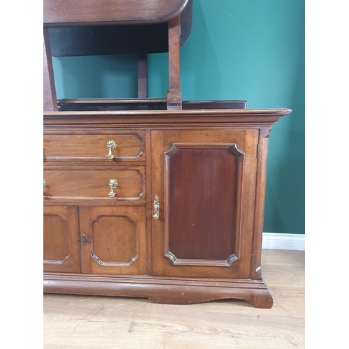 6 - A mahogany Sideboard with raised gallery, fitted two drawers above pair of cupboard doors, flanked b... 