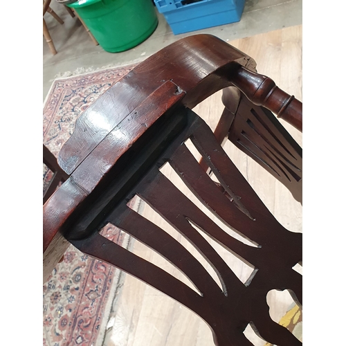 67 - A Georgian mahogany Corner Chair with shaped arms, turned supports, upholstered drop in seat, replac... 