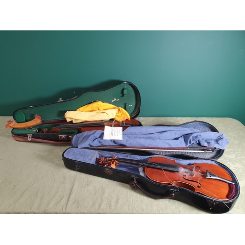 800 - A Violin with double perfling and two piece back in case with outer canvas case and another with two... 