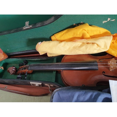 800 - A Violin with double perfling and two piece back in case with outer canvas case and another with two... 