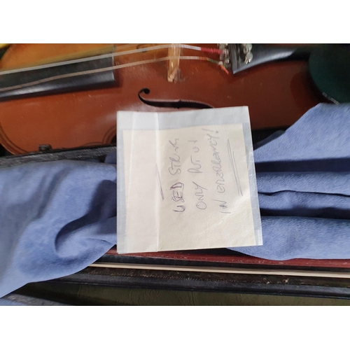 800 - A Violin with double perfling and two piece back in case with outer canvas case and another with two... 