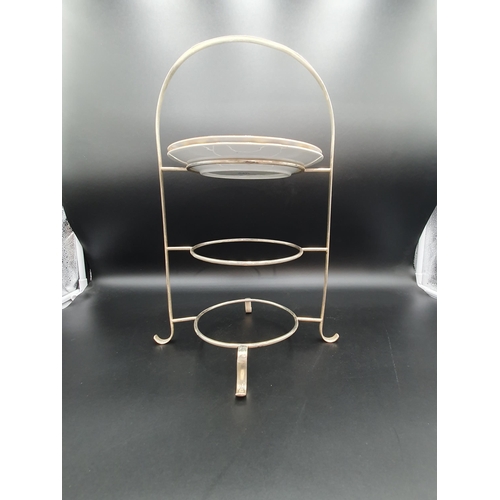 84 - A plated three tier Cakestand and two Paragon Plates, one A/F