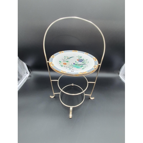 84 - A plated three tier Cakestand and two Paragon Plates, one A/F