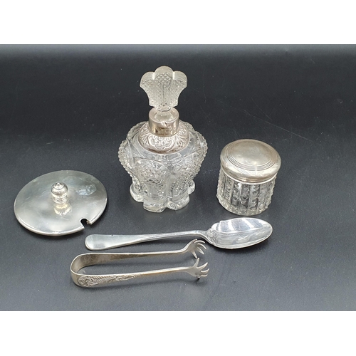 87 - An Edward VII silver mounted glass Scent Bottle, Birmingham 1903, a silver lidded Jar, plated Tongs ... 