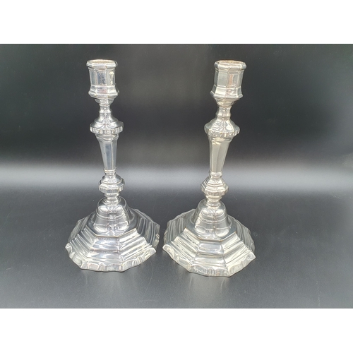 89 - A pair of Queen Anne style plated Candlesticks on octagonal bases, 9in, and two oval Entree Dishes a... 