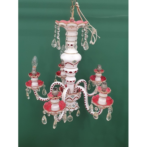 799 - A five branch overlaid glass Electrolier with clear pendant glass drops and painted sprays of flower... 