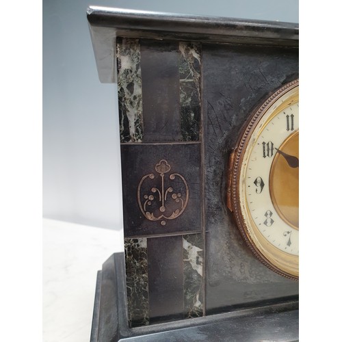 65 - An engraved black marble/slate Mantel Clock with circular dial and key, 9in H