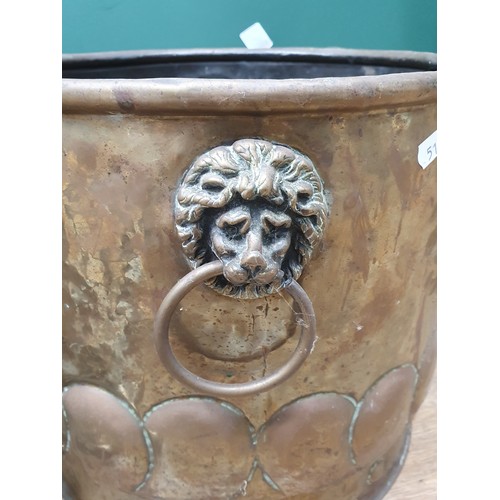 519 - An Arts and Crafts brass Coal Box, a copper Log Bin with lion mask ring handles and a plated Student... 