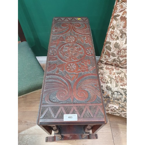 483 - A mahogany Sutherland Table with floral and geometric carved decoration on turned supports 2ft 3in H... 