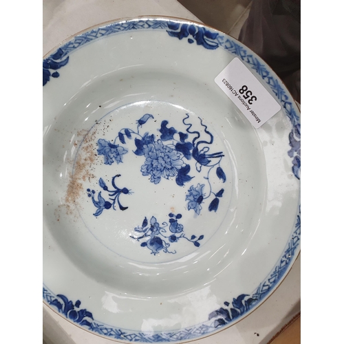 358 - Two 19th Century blue and white Chinese Plates with central floral designs A/F 11