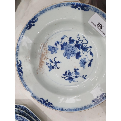 358 - Two 19th Century blue and white Chinese Plates with central floral designs A/F 11