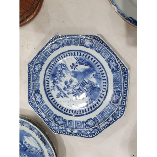 358 - Two 19th Century blue and white Chinese Plates with central floral designs A/F 11