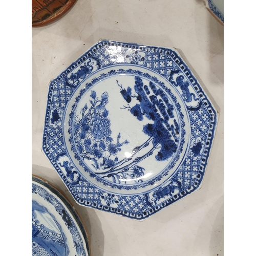 358 - Two 19th Century blue and white Chinese Plates with central floral designs A/F 11