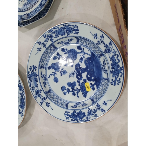 358 - Two 19th Century blue and white Chinese Plates with central floral designs A/F 11