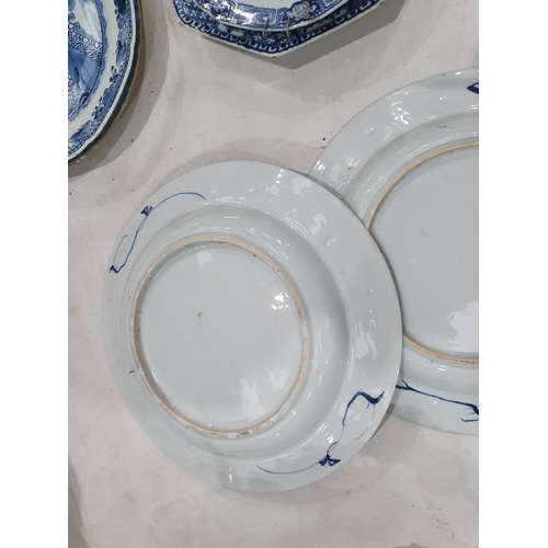 358 - Two 19th Century blue and white Chinese Plates with central floral designs A/F 11