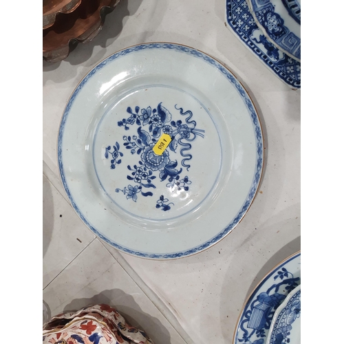 358 - Two 19th Century blue and white Chinese Plates with central floral designs A/F 11