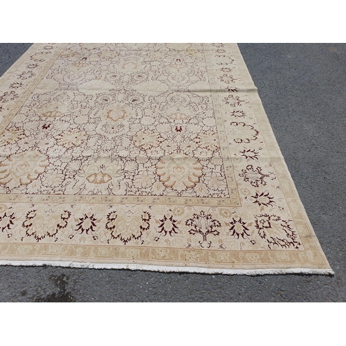 1 - An Ushak style wool Carpet the beige and maroon sylised floral design on cream ground, 10ft x 14ft, ... 