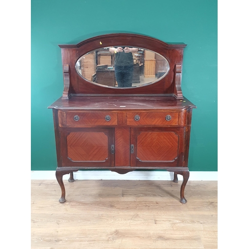 10 - A mahogany mirror back Sideboard, fitted pair of drawers above pair of panelled doors raised on cabr... 