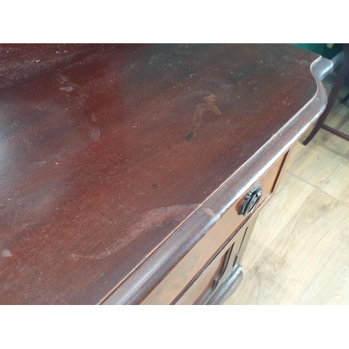 10 - A mahogany mirror back Sideboard, fitted pair of drawers above pair of panelled doors raised on cabr... 