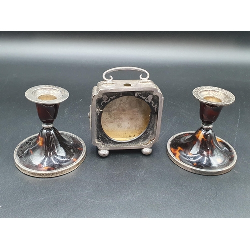 117 - A pair of George V silver and tortoiseshell Candlesticks on circular bases, Birmingham 1925, A/F, an... 