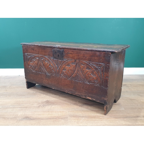 13 - A 17th Century oak Six plank Chest with carved arched and floral designs, 1ft 8